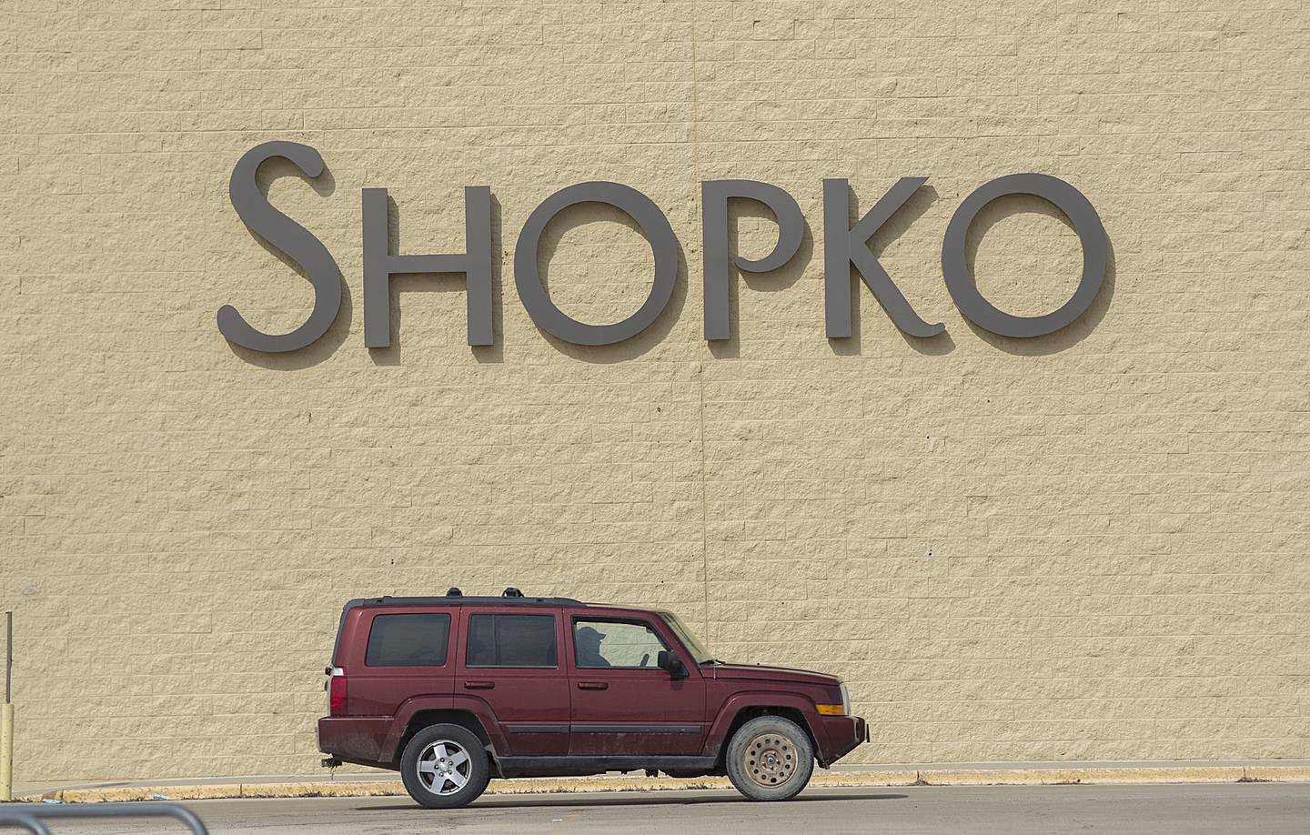 A vehicle passes by the Shopko building on north Galena in DIxon Monday, March 14, 2022. The building has been sold.