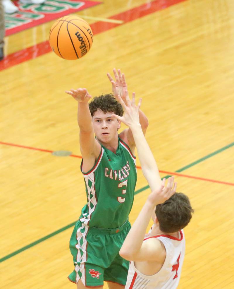 L-P's Mikey Hartman sinks a three point basket over Streator' Blaize Bressner during the Class 3A Regional title game on Friday, Feb. 28, 2025 in Sellett Gymnasium at L-P High School.