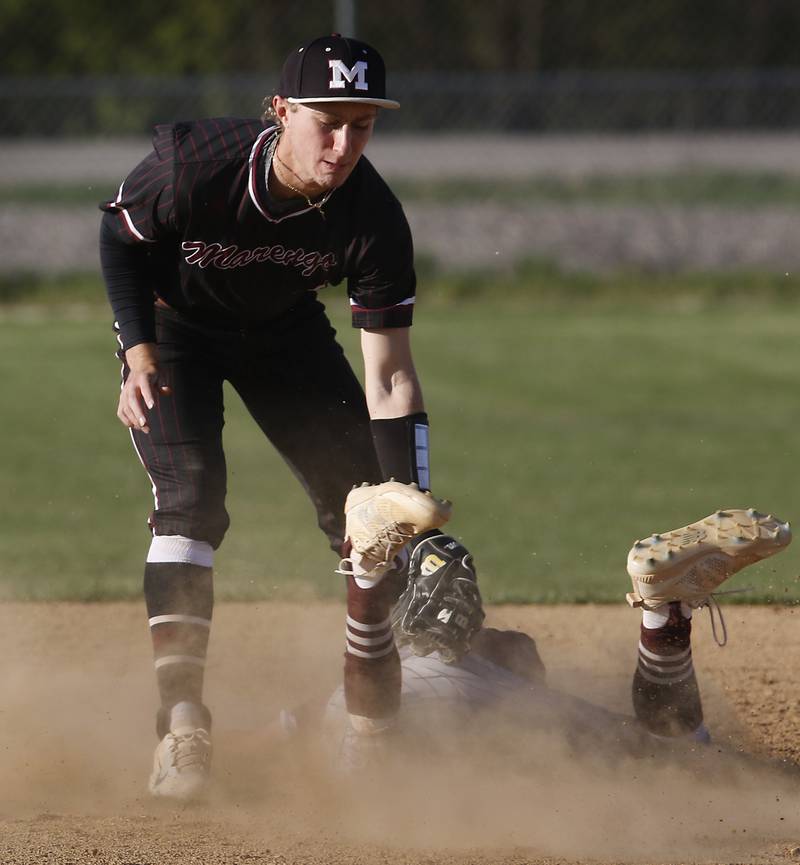 Marengo's Quinn Lechner tags out Richmond-Burton's Ryan Junge as he tries to steal second base during a Kishwaukee River Conference baseball game on Thursday, April 25, 2024, at Marengo High School.