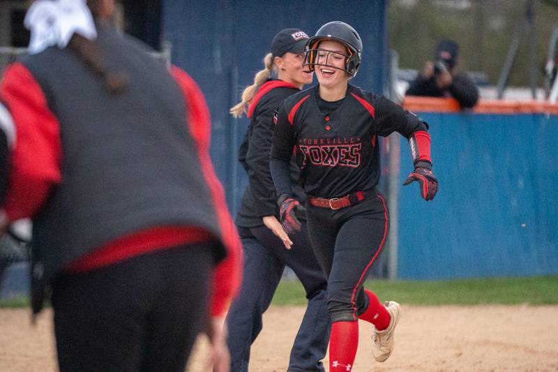 Yorkville's Kaitlyn Roberts (8) smiles after hitting a homer against Oswego during a softball game at Oswego High School on Tuesday, April 25, 2023.
