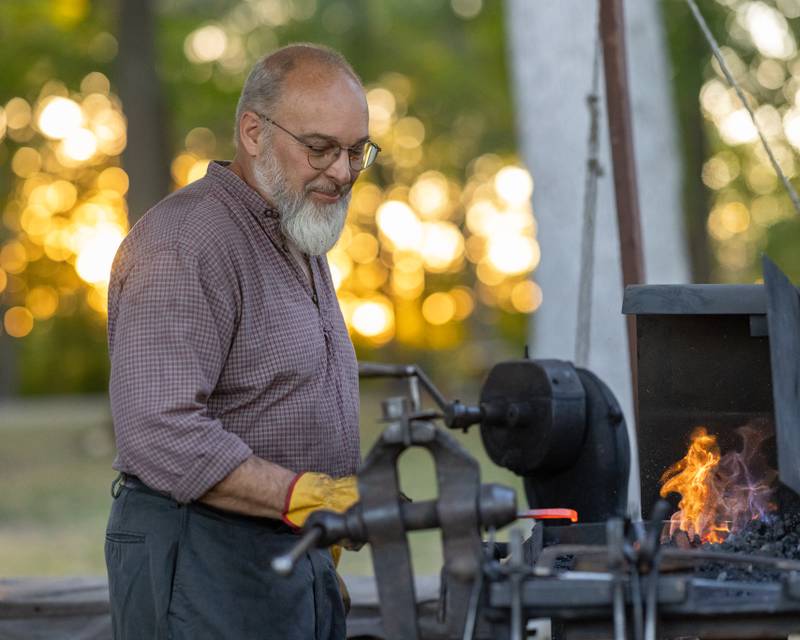 A blacksmith was one of many different time accurate demonstrations at The Blue and Gray Civil War reenactment at City County Park on October 10, 2025 in Princeton.