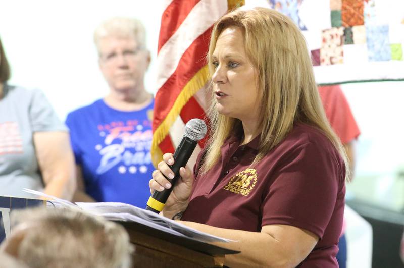 Amy Waca, commander of the Wyanet VFW speaks during the Quilt of Valor Tribute to Veterans on Wednesday, Aug. 20, 2025 at the Bureau County Fair in Princeton.
