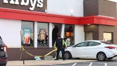 Photos: Car strikes Arbys in Peru