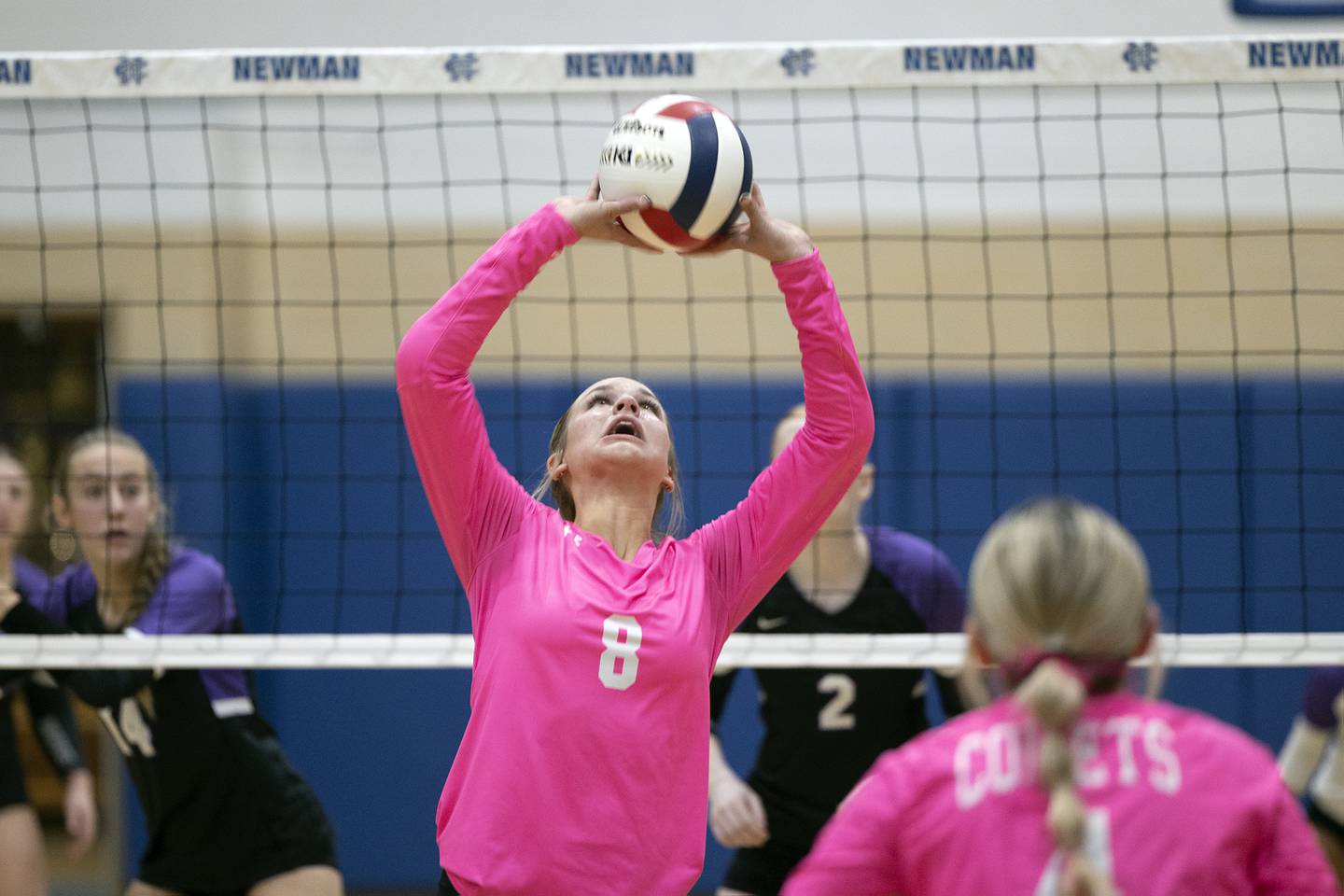 Newman’s Brooklyn Smith sets against Dixon Thursday, Oct. 3, 2024, at Newman High School.