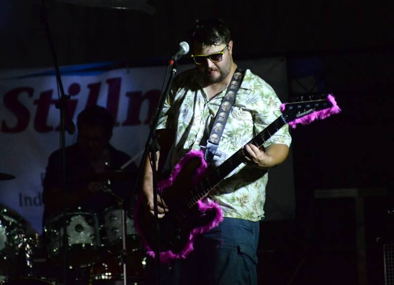 A member of The Killer B's plays the guitar at the Ogle County Fair on Friday, Aug. 2, 2024.
