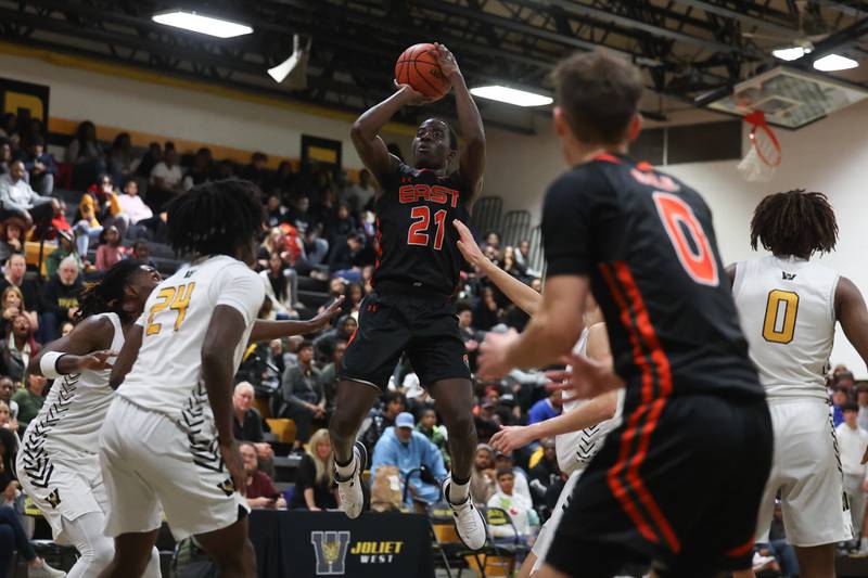 Plainfield East’s Kevin Tchoffa puts up the shot against Joliet West on Friday, Dec. 8th, 2023 in Joliet.