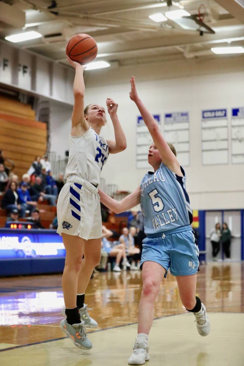 Princeton's Keighley Davis shoots over Bureau Valley's Kate Salisbury Thursday night at Prouty Gym.