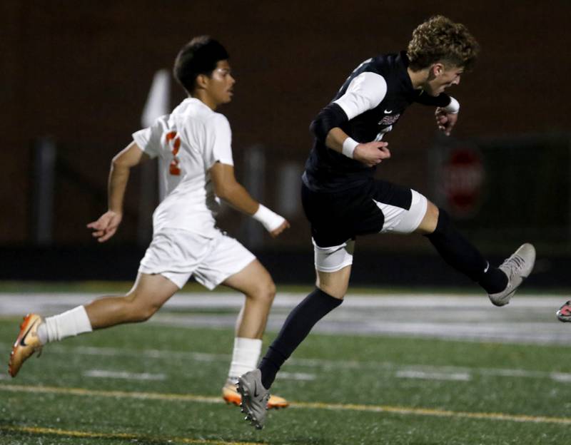 Prairie Ridge's Chase Santucci watches as his shot on goal goes into the goal during the IHSA Boys Soccer 2A Grayslake Central Sectional semifinal match Crystal Lake Central  on Tuesday, Oct. 29, 2024, at Grayslake Central High School.