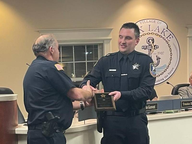 Police officer Jonathan Cawley was presented with the village of Fox Lake’s Lifesaving Award at the Oct. 11, 2022, village board meeting.