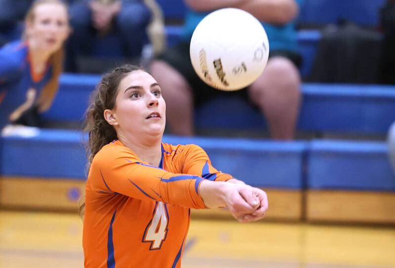Genoa-Kingston's Hannah Langton bumps the ball Thursday, Oct. 27, 2022, during their Class 2A Regional final match against Marengo at Rosary High School in Aurora.
