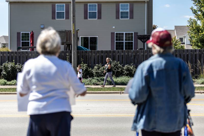Members of the community share smiles with ‘Workers Over Billionaires’ Labor Day Protest participants on the 1100 block of N. River Rd. in Shorewood, IL, on Sept. 1, 2025.