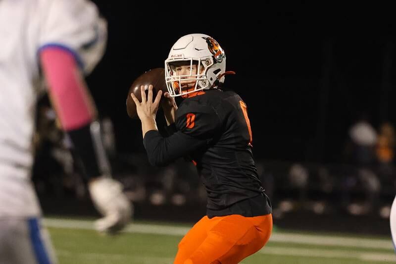 Plainfield East’s Hugh Callaghan looks to pass against Joliet Central on Oct. 4, 20234 in Plainfield.