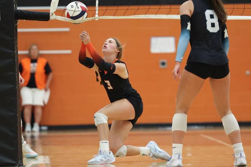 Minooka’s Kennedy Walker tries to keep the volley alive against Joliet Catholic on Wednesday, Sept. 4, 2024 in Minooka.