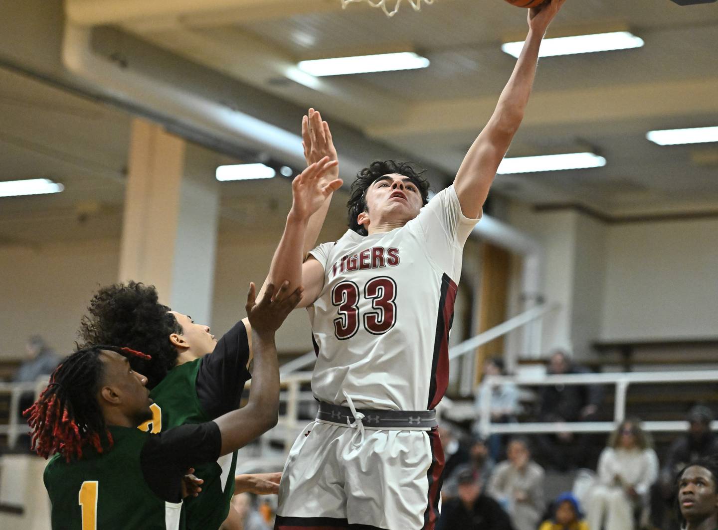 Plainfield North's Jeffrey Fleming goes of strong for a layup during a conference game against Joliet Central on Friday, Jan. 19, 2024, at Joliet. (Dean Reid for Shaw Local News Network)
