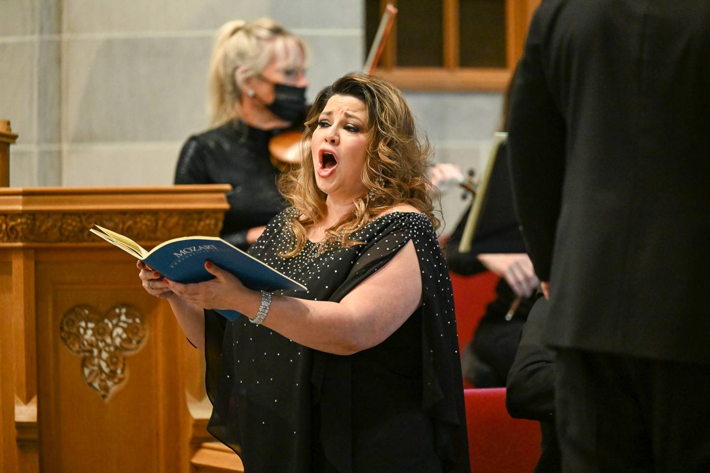 The St. Charles Singers in April 2022 in the penultimate "Mozart Journey" series concert. Guest soloist Michelle Areyzaga.