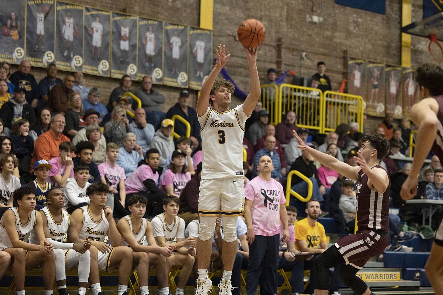 Sterling’s Kyle Billings puts up a three point shot against Moline Friday, Feb. 10, 2023.