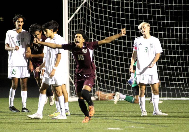 Elgin’s Miguel Navarro (10) celebrates his game-tying goal in the second half of the 3A Boys Soccer Supersectional against York at Streamwood High School on Tuesday, Nov. 1, 2022.