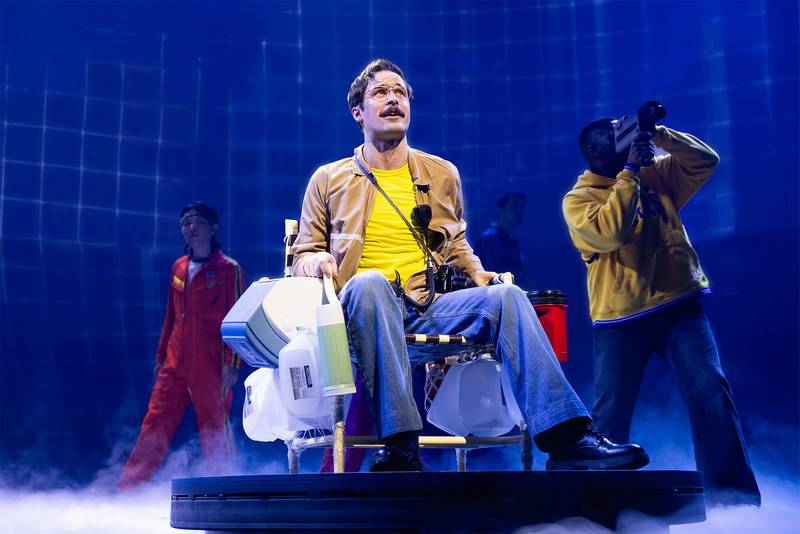 Charlie McCullagh as Larry Walters in Chicago Shakespeare’s North
American premiere production of 42 Balloons, a soaringly original musical
inspired by the crazy but true story of a man with 42 weather balloons, a
lawn chair, and a dream, written by Jack Godfrey and directed by Ellie
Coote. Running May 24–June 29, 2025, in The Yard at Chicago Shakespeare.
