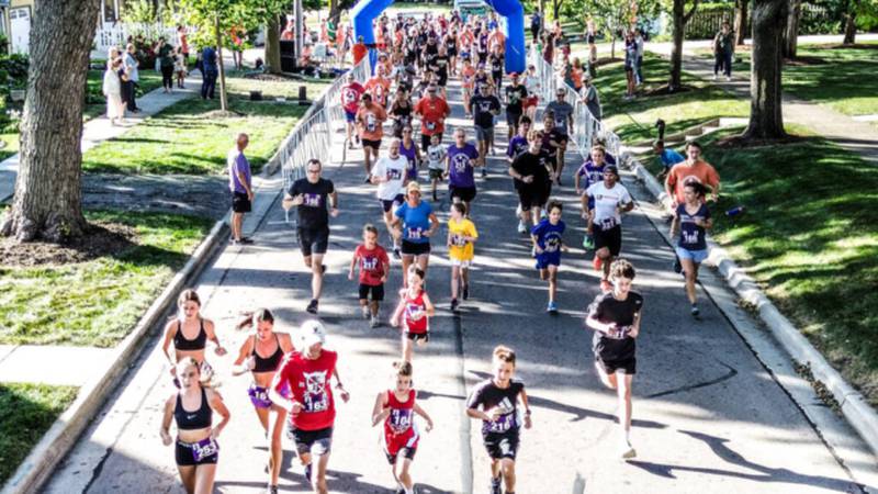 Runners hit the streets of Downers Grove during the 2024 Ben's Memorial Mile. The run raises money for mental health and honors the legacy of Ben Silver