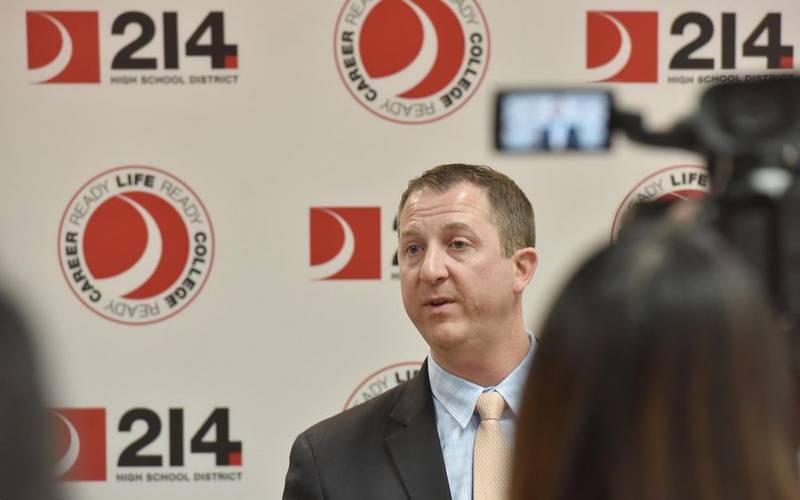 Scott Rowe speaks to a group of student journalists Thursday after being announced as the new Northwest Suburban High School District 214 superintendent.