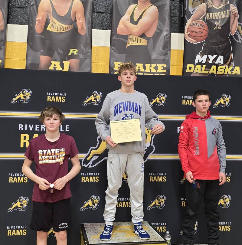 Newman's Landon Near, center, is pictured after winning the 106-pound title at the Riverdale Regional on Saturday, Feb. 8, 2025. Morrison's Cael Wright, right, was runner-up and Rockridge's Nate Lower, left, was third.
