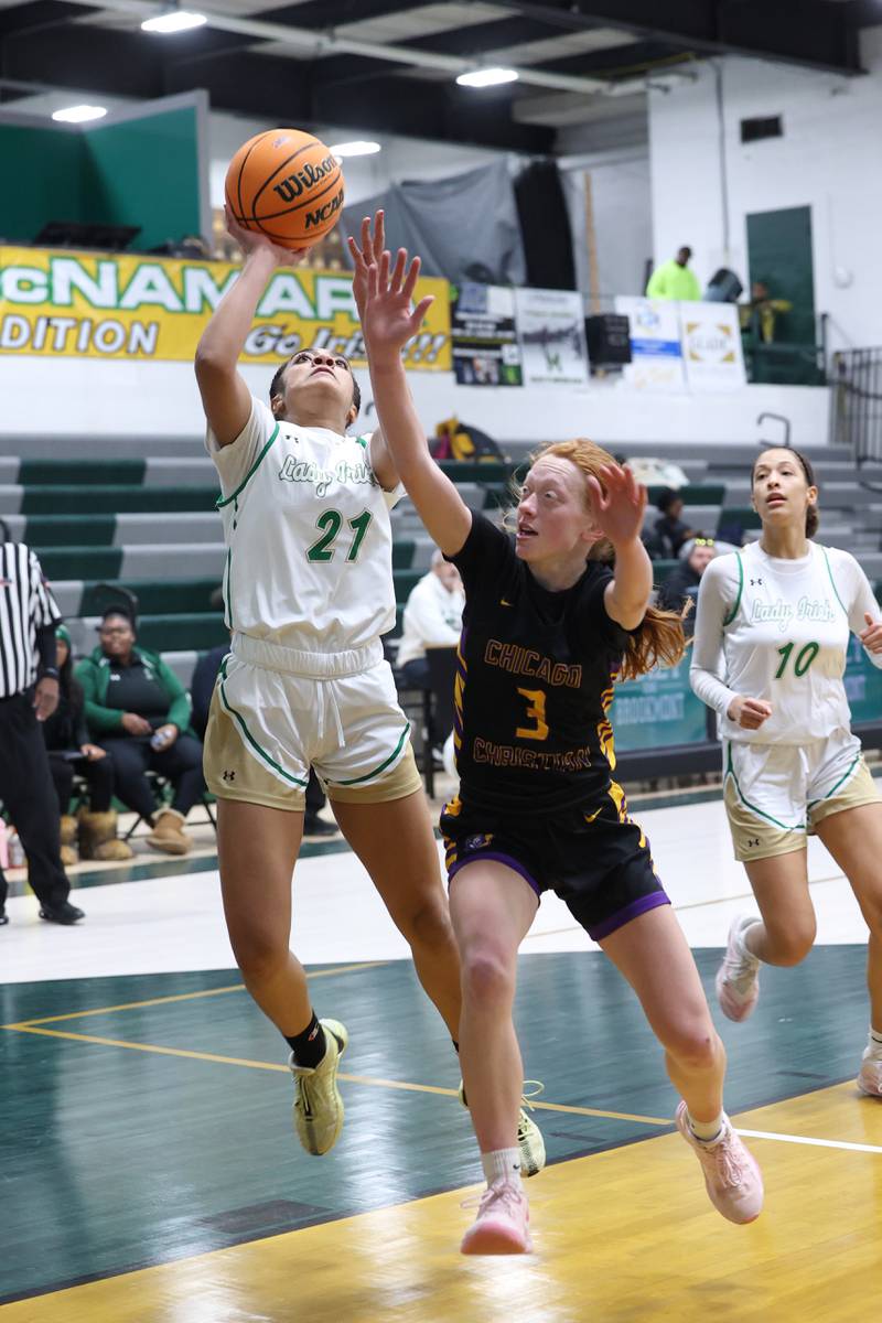 Bishop McNamara's Keneyce Davis shoots under pressure during the Fightin' Irish's 67-27 victory over Chicago Christian on Monday, Jan. 26, 2026.