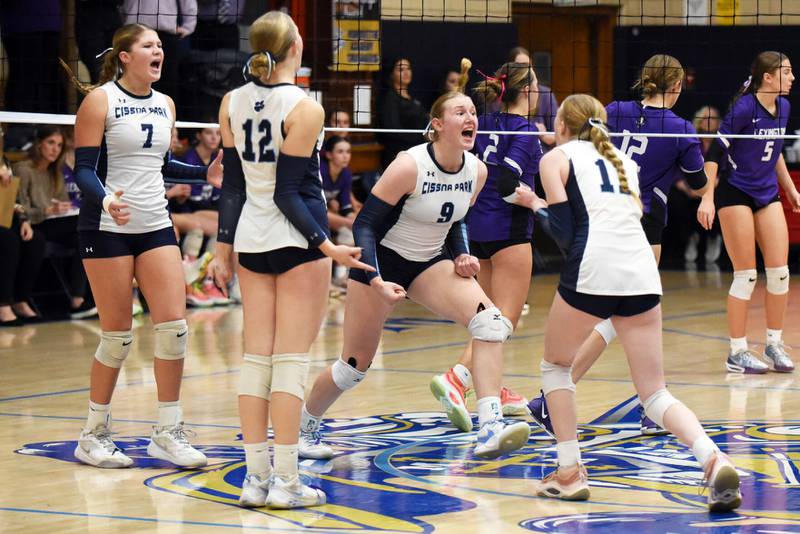 Cissna Park’s Addison Lucht (9) and Sophie Duis (11) look at each other in celebration near the end of their 2-0 win against Lexington in the IHSA Class 1A Marquette Sectional championship last month. Lucht is the repeat Daily Journal Girls Volleyball Player of the Year.