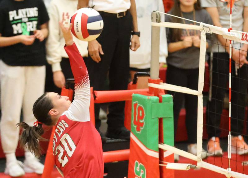 L-P's Anna Riva spikes the ball during the Class 3A Sectional final game on Thursday, Nov. 6, 2025 in Sellett Gymnasium at L-P High School.