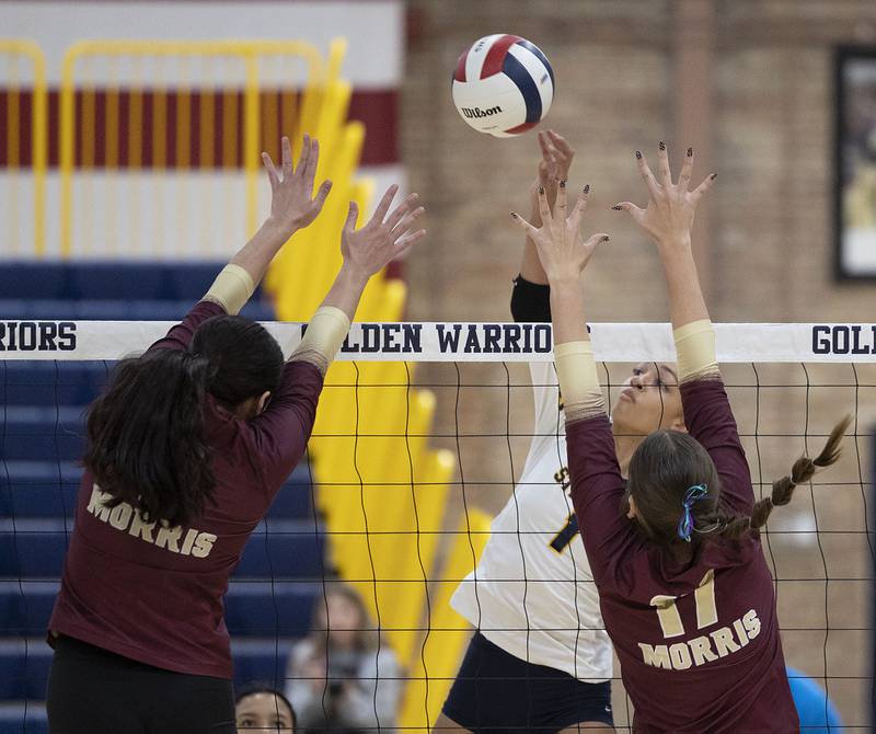 Sterling’s Nia Harris plays the ball against the Morris defense Thursday, Oct. 30, 2025, in the Class 3A volleyball regional.