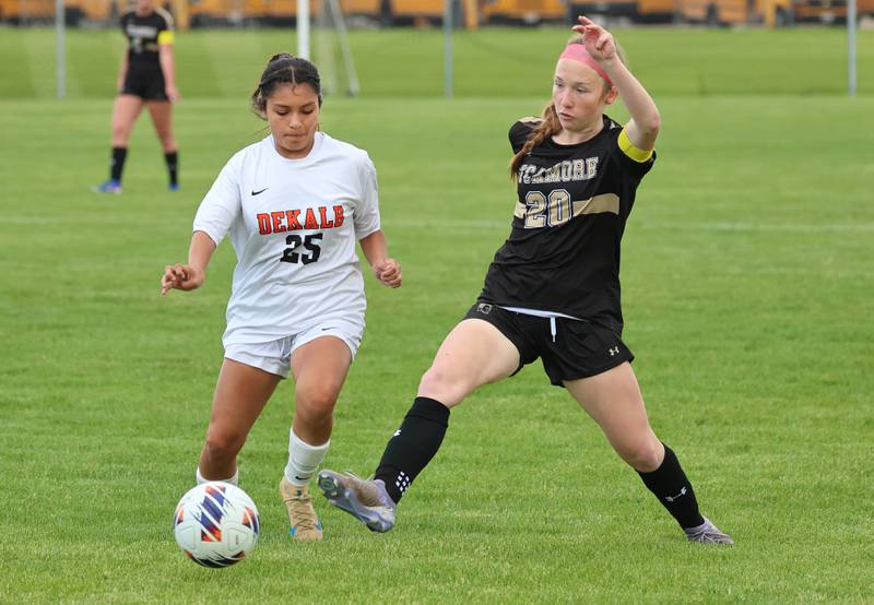 DeKalb's Evelyn Guerra Cruz and Sycamore's Cortni Kruizenga try to gain possession Thursday, May 7, 2026, during their game at Sycamore High School.