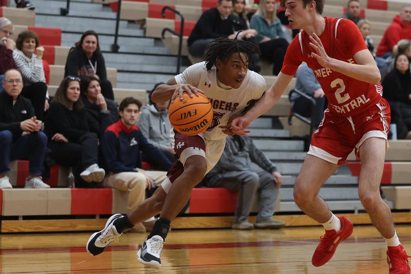 Plainfield North’s Darin Ashiru drives to the baseline against Naperville Central on Wednesday, Jan 22, 2025 in Plainfield.