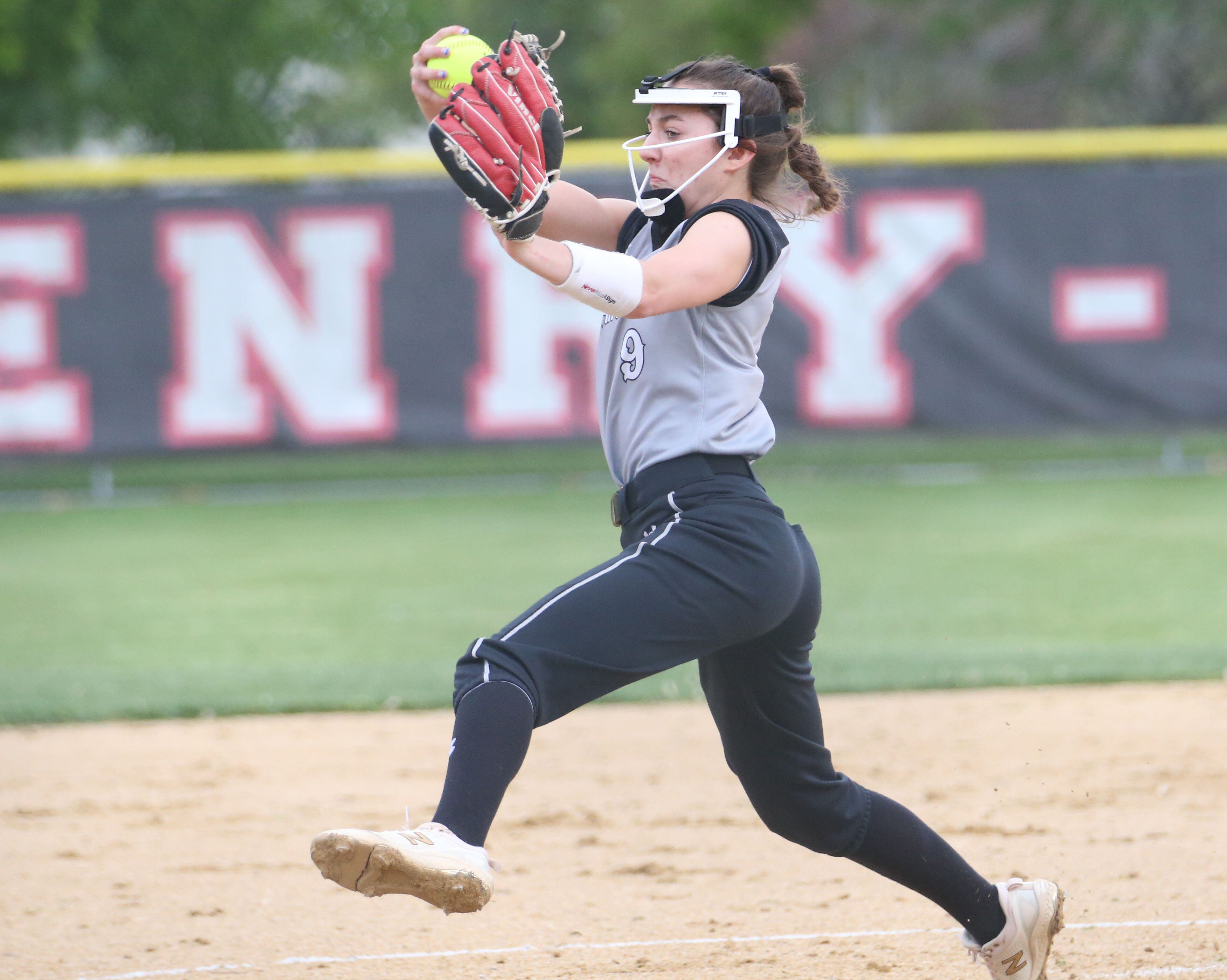 Woodland/Flanagan-Cornell ace Shae Simons delivers a pitch to Henry-Senachwine this past season in Henry.