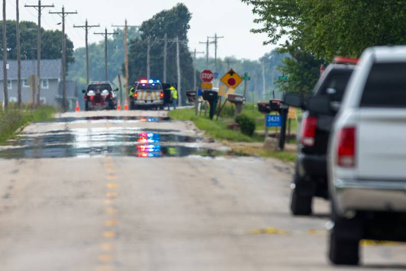 Law enforcement vehicles block entry onto 42nd Road on Thursday, July 17, 2025 in Sheridan.