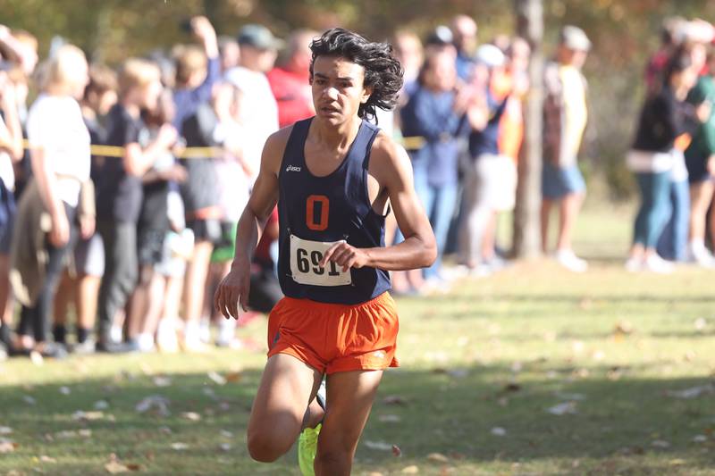 Oswego’s Matt Padilla finishes 5th in the Boys Cross Country Class 3A Minooka Regional at Channahon Community Park on Saturday.