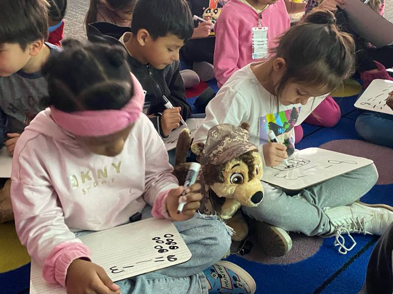 First graders in Sharlene Lee's class at Indian Hill Elementary in Round Lake Heights took Max around with them.