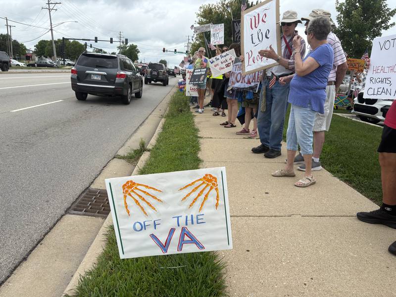 A sign lines Route 31 in McHenry during a protest July 26, 2025.