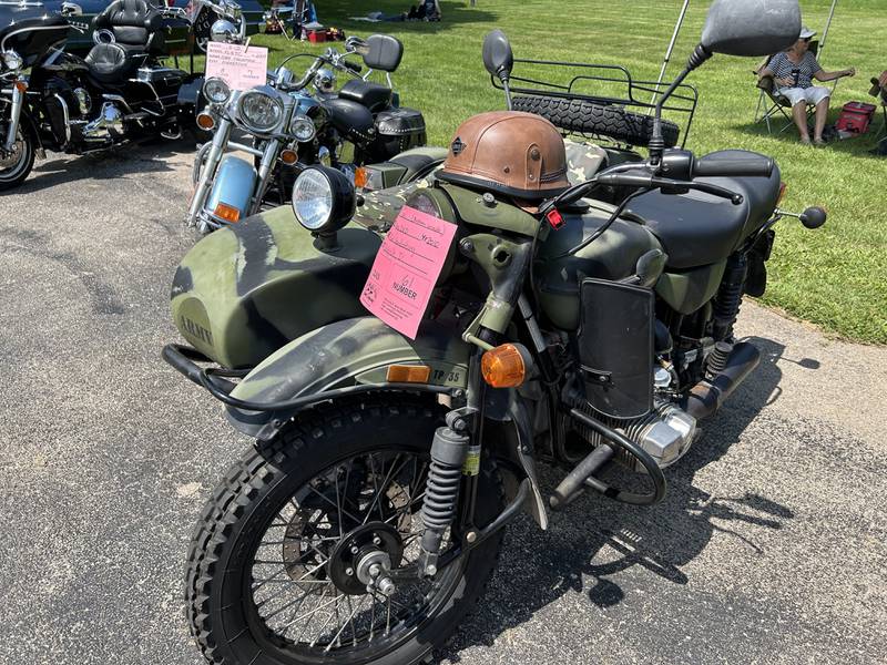 Mark Vandenberg of Baileyville brought his 2010 Ural motorcycle to Forreston Sauerkraut Days' car show  on Saturday, Aug. 3, 2024. The cycle was built in Russia.