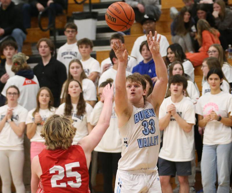 Bureau Valley's Elijah Endress shoots a three-point basket over Hall's Wyatt West on Friday, Jan. 19, 2024 at Bureau Valley High School.