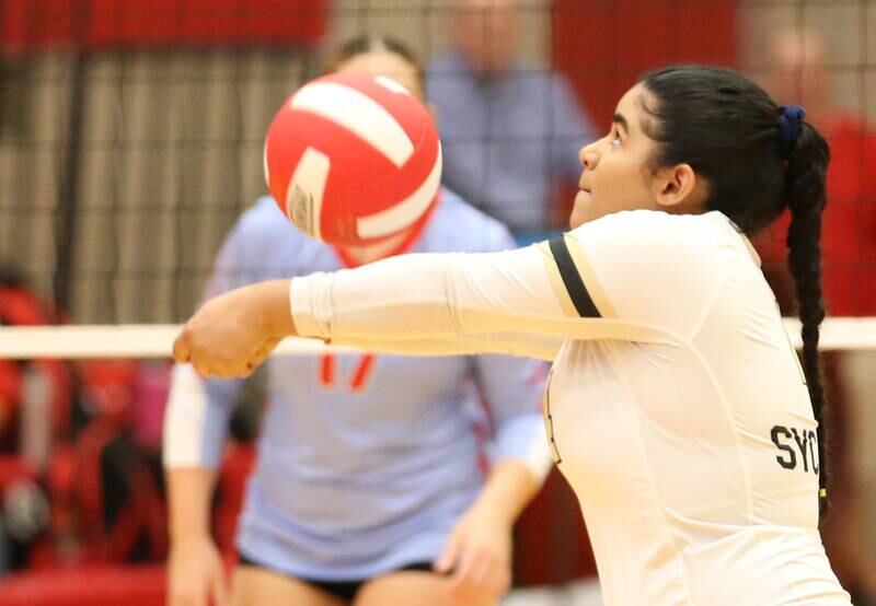 Sycamore's HatieJane Alexander returns a serve from Ottawa on Thursday, Oct. 12, 2023 at Kingman Gym.