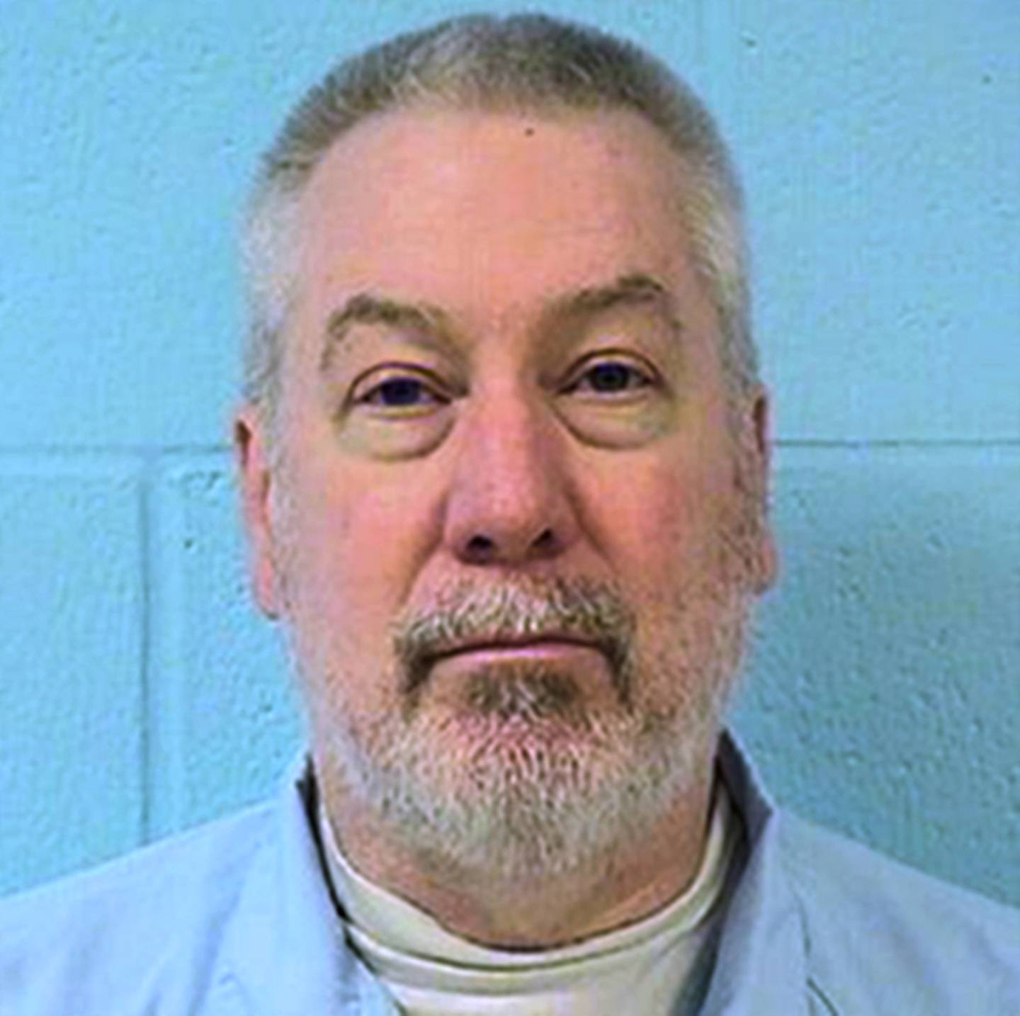 FILE - This undated file photo provided by the Illinois Department of Corrections shows former Bolingbrook, Ill., police officer Drew Peterson. Peterson's murder-for-hire trial in southern Illinois was postponed by a Randolph County judge Tuesday, Sept. 29, 2015, until early next year. Peterson is charged with soliciting an inmate to kill Will County State's Attorney James Glasgow, who prosecuted the 2012 case in which Peterson was sentenced to 38 years in prison for the bathtub drowning death of ex-wife Kathleen Savio.  (Illinois Department of Corrections via AP, File)
