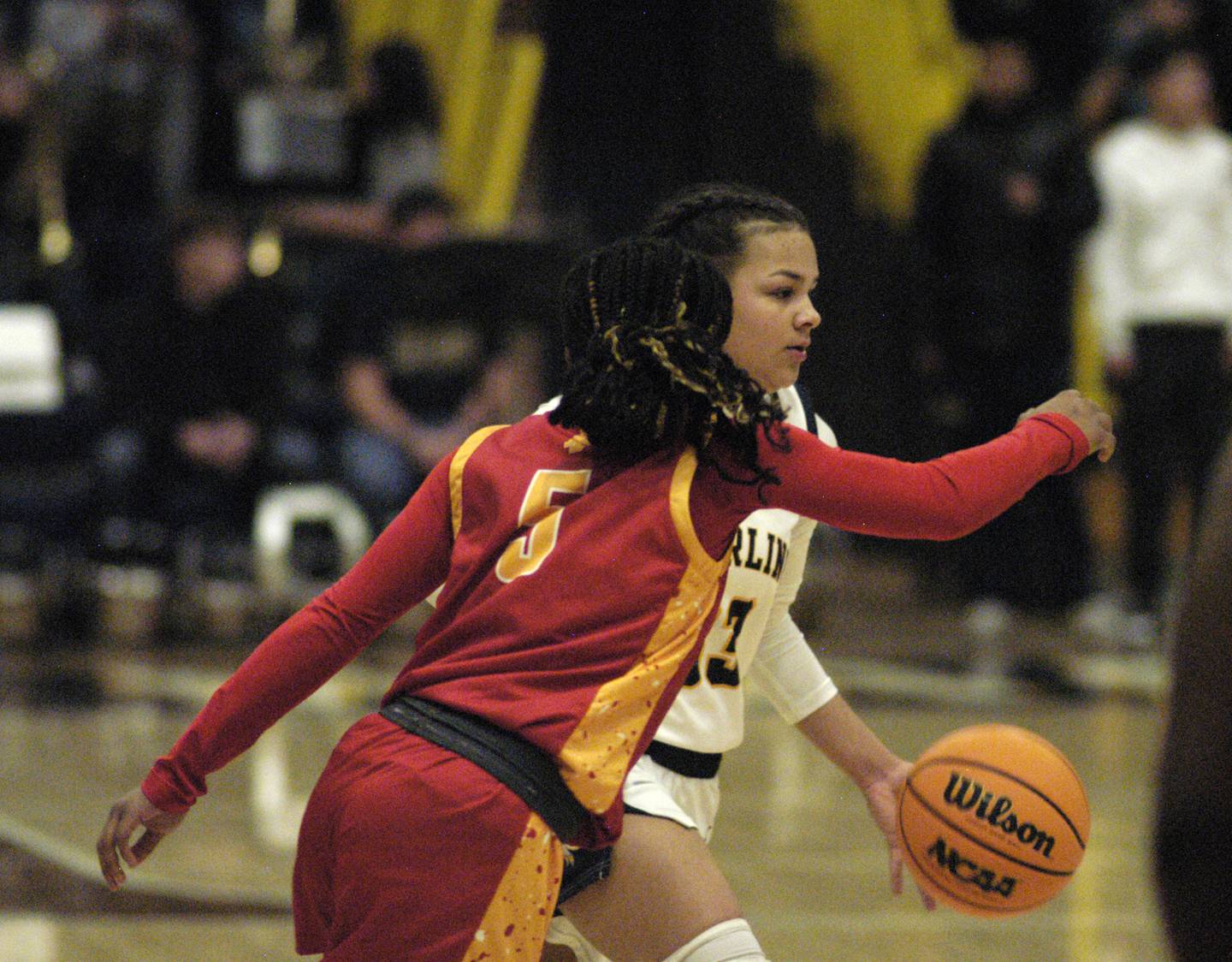 Sterling's Joslynn James drives the ball past a RockIsland defender. Western Big 6 conference champions Sterling hosted Rock Island in girls basketball. The action took place Thursday, February 13, 2025 at Musgrove Fieldhouse at SHS.