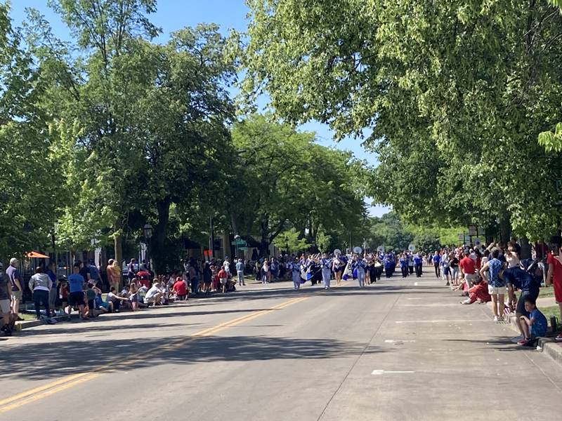 Geneva High School marching band walks north on 3rd Street to start the Memorial Day parade on Monday, May 29, 2023.