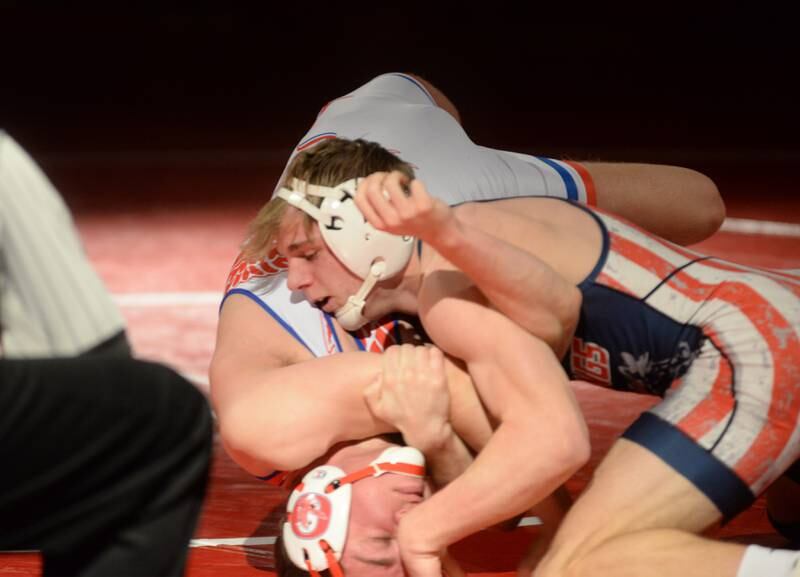 Morrison's Brady Anderson (top) holds his Oregon opponent on the mat during a 165-pound match at a triangular meet with Sandwich on Friday, Jan. 31, 2025 in the Blackhawk Center at Oregon High School.