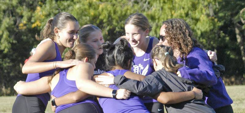 Dixon CC runners get together before the race. Local High School teams gathered at Hoover Park in Sterling for the Rock River Run, held on Saturday, September 27, 2025.