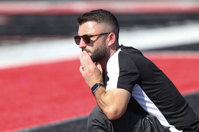 Lincoln-Way East head coach Matthew Ribbens watches the match against Bolingbrook on Saturday, Sept. 30, 2023 in Bolingbrook.
