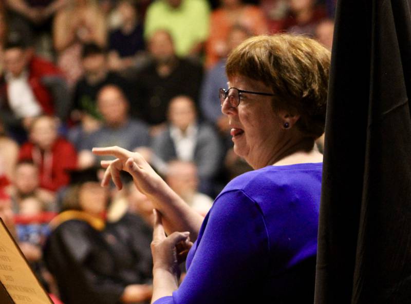 Ann Gronlund provides sign language interpretation for the deaf during Sauk Valley Community College commencement on Friday, May 12, 2023.