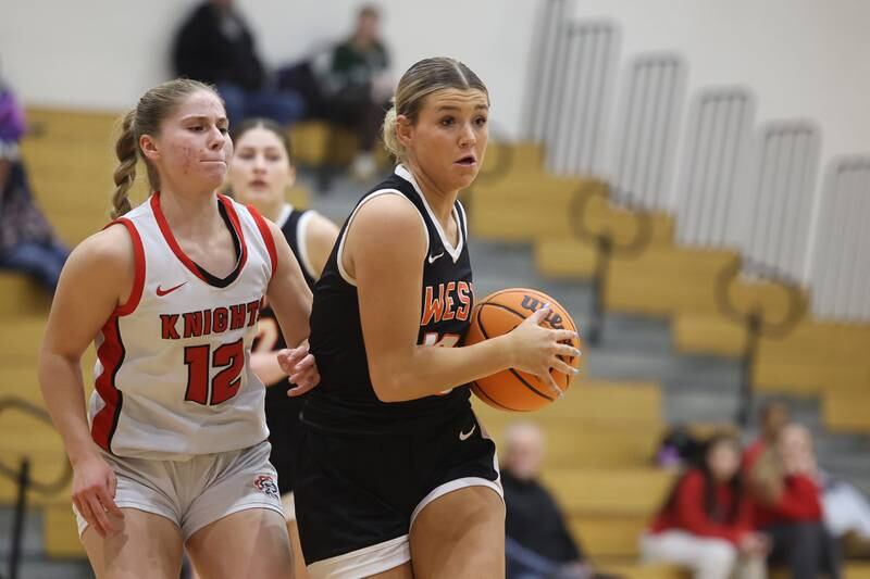 Lincoln-Way West’s Molly Finn looks for a play against Lincoln-Way Central on Tuesday, Jan 28, 2025 in New Lenox.