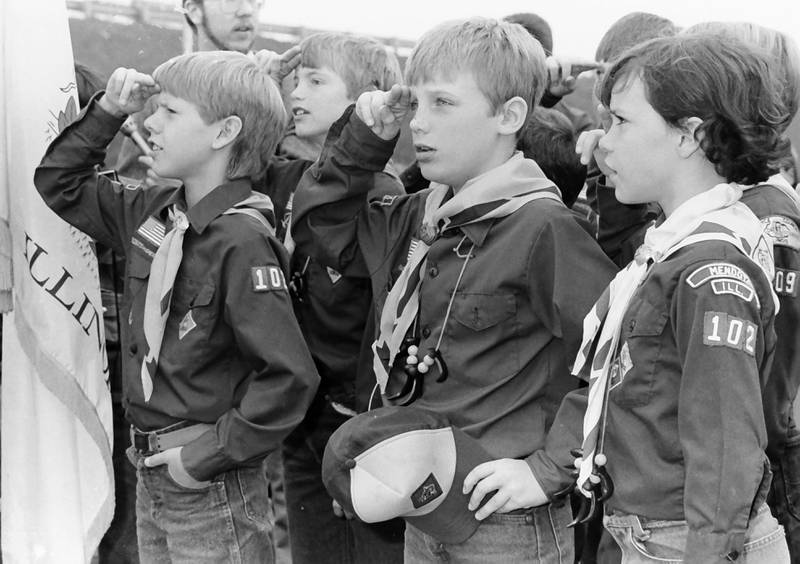 The Mendota Boy Scouts Troop 102 salutes the American Flag during a ceremony of the opening of Interstate 39 on Friday, Oct. 18, 1985. in Mendota.