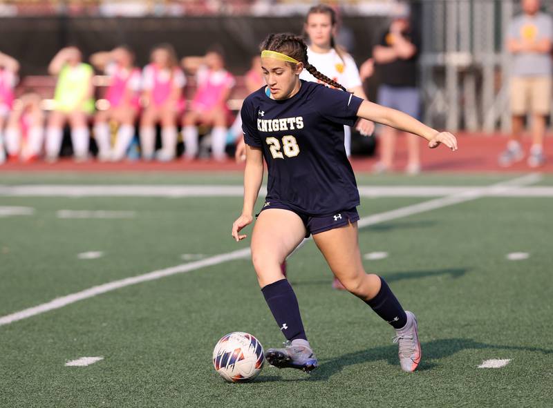 IC Catholic's Lillianna Costa (28) handles the ball during the IHSA Class 1A girls soccer super-sectional match between Richmond-Burton and IC Catholic at Concordia University in River Forest on Tuesday, May 23, 2023.