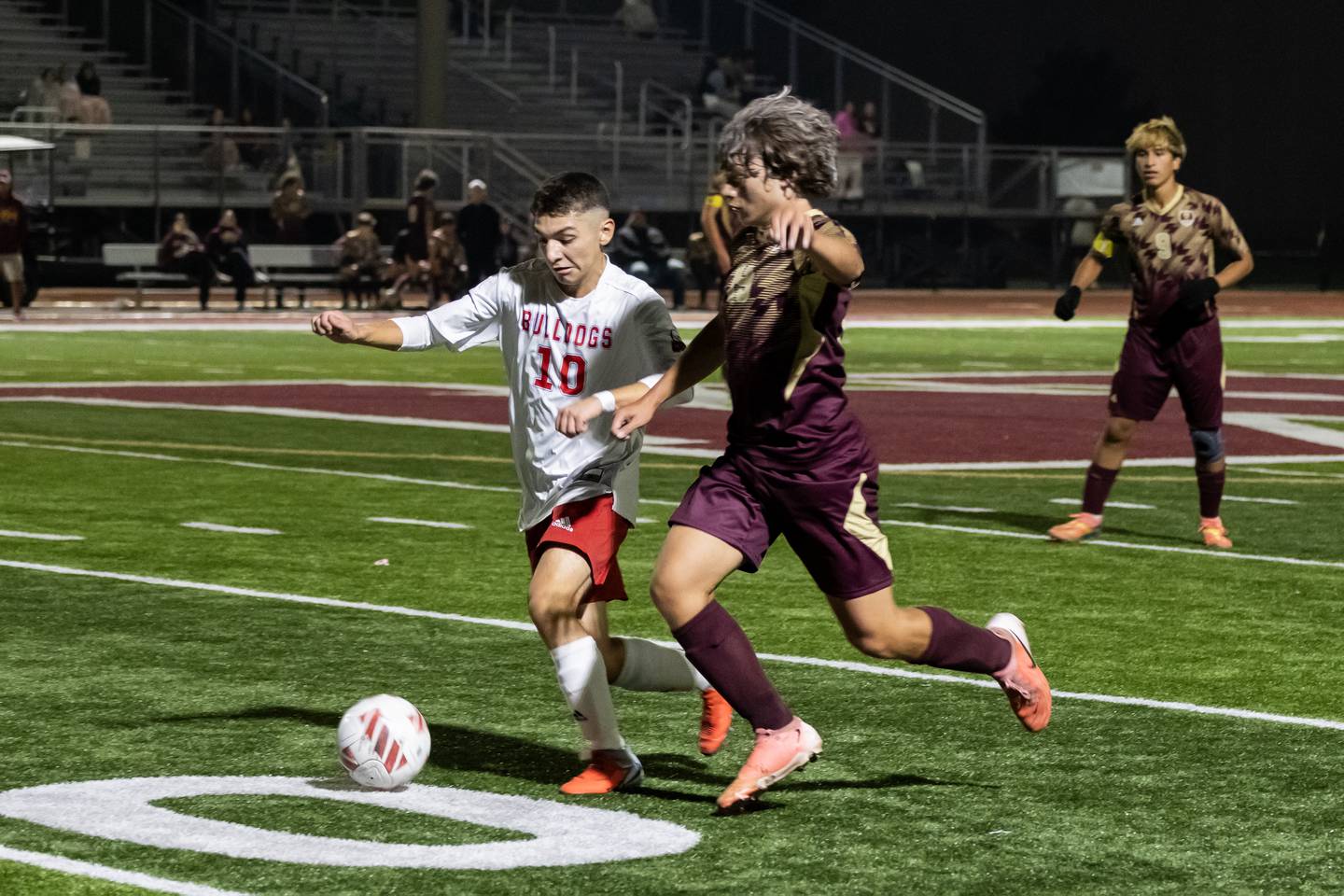Streator's Enrique Rodriguez and Morris's Giovanni Archer fight for control of the ball during a varsity soccer game at Morris on Oct. 15, 2025.